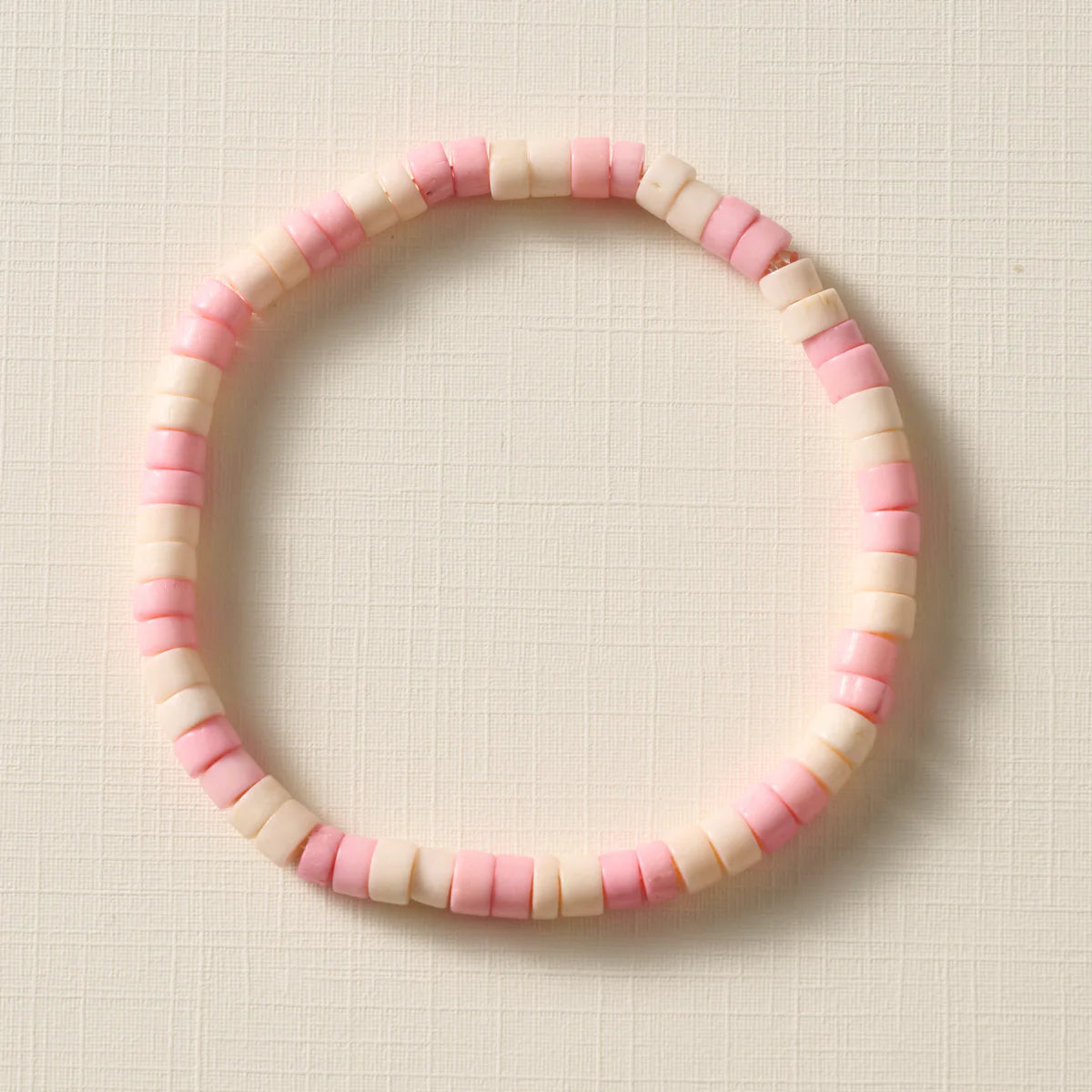 BRACELET THOTA BONE BEAD TAN PINK